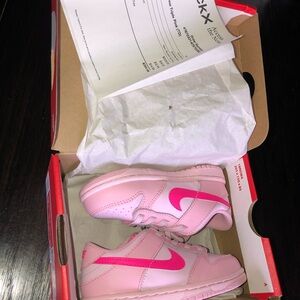 Triple pink Nike Dunks